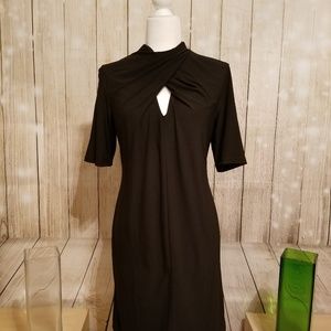 Black dress with open top notch
